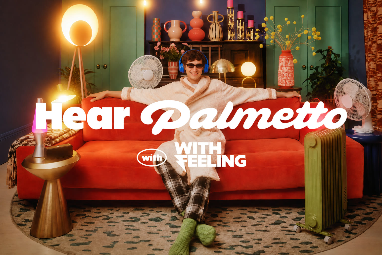 Hear Palmetto, WithFeeling: a listener in headphones at home on a Palmetto-red sofa